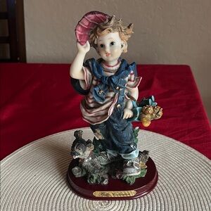 Vintage Bello Collection Figurine with Red Base